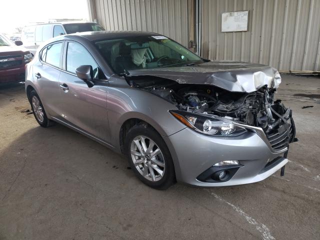 2015 mazda 3 grand to