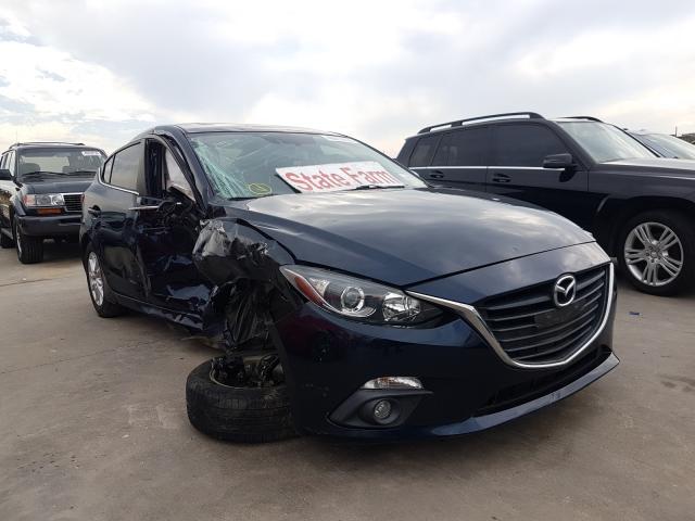 2015 mazda 3 grand to