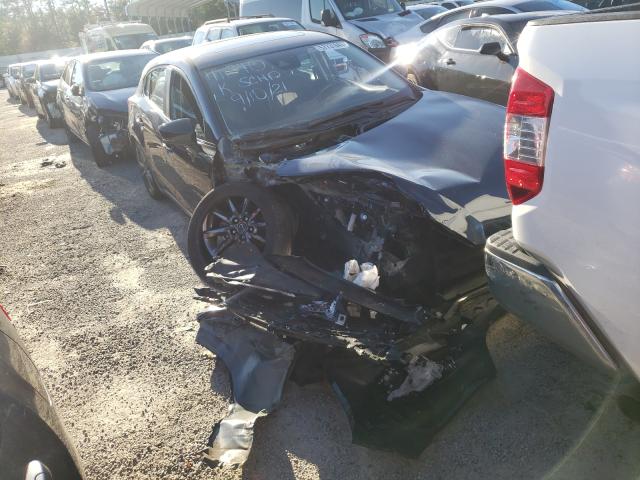 2018 mazda 3 grand to
