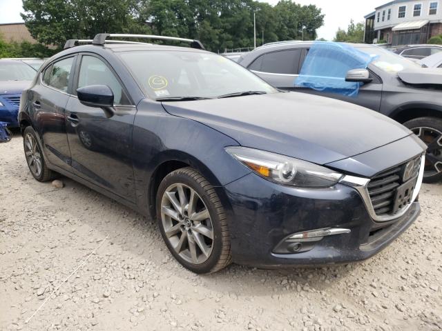 2018 mazda 3 grand to