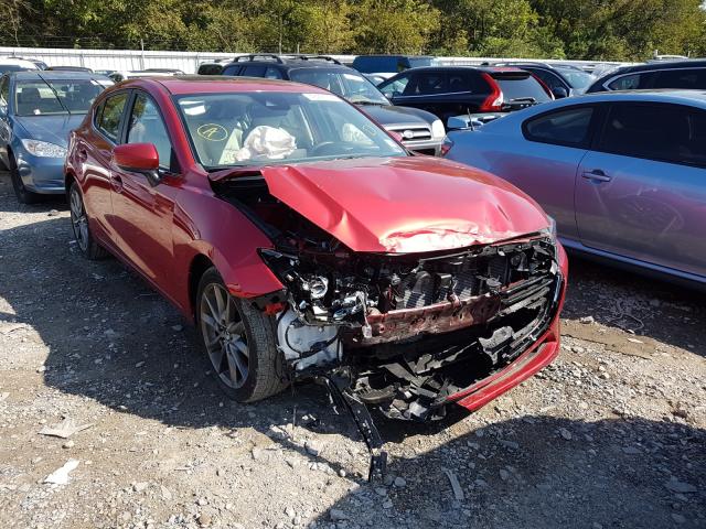2018 mazda 3 grand to