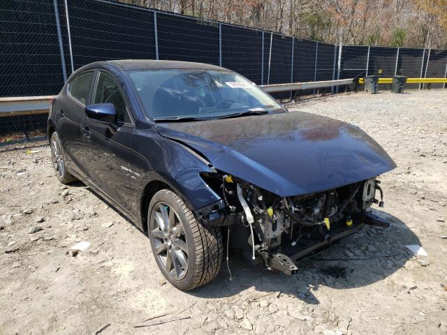 2018 mazda 3 grand to