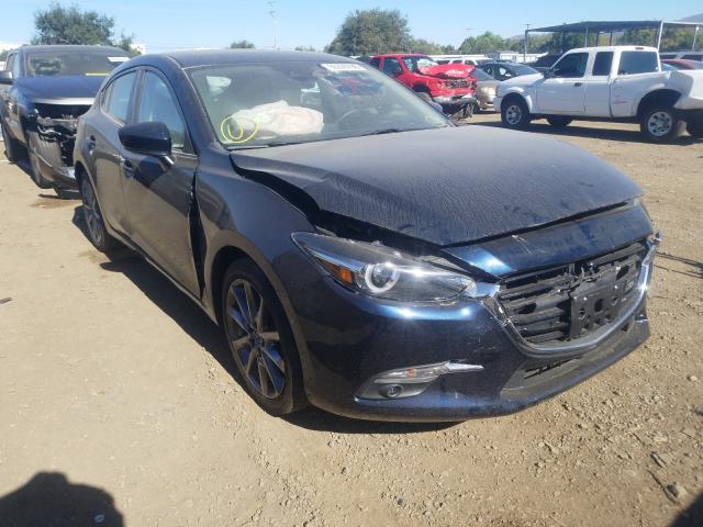 2018 mazda 3 grand to