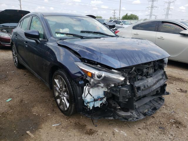 2018 mazda 3 grand to