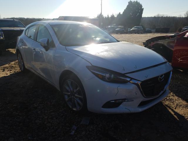2017 mazda 3 grand to