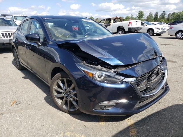 2018 mazda 3 grand to