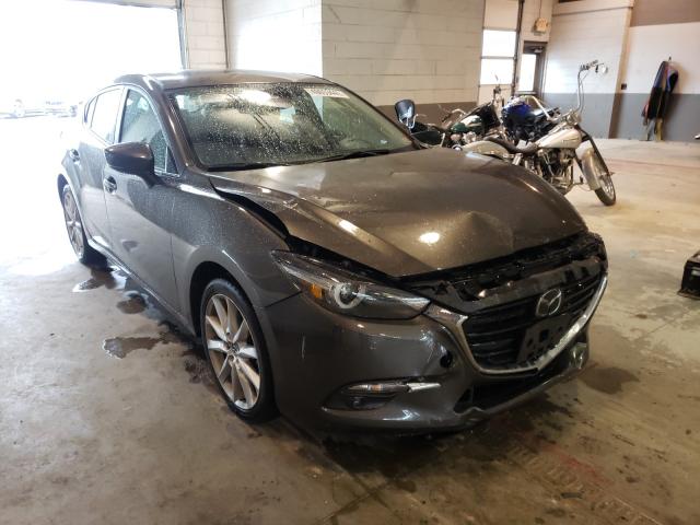 2017 mazda 3 grand to