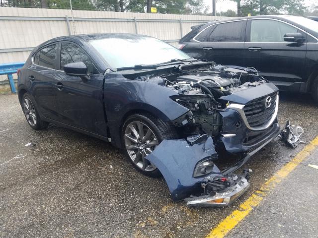 2018 mazda 3 grand to