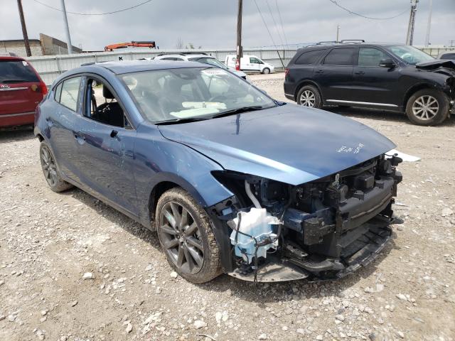 2018 mazda 3 grand to
