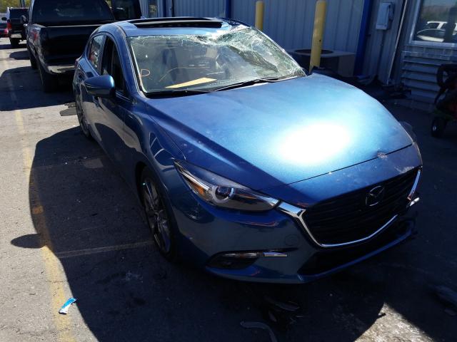 2017 mazda 3 grand to