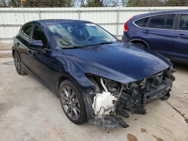 2018 mazda 3 grand to
