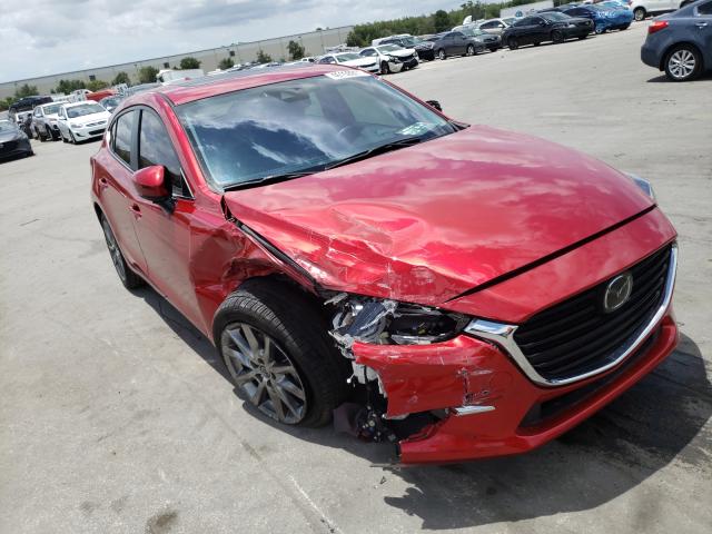 2018 mazda 3 grand to