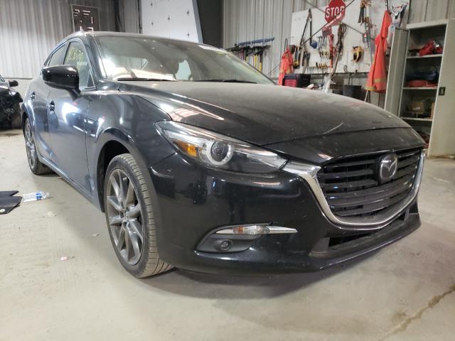 2018 mazda 3 grand to