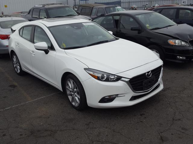 2017 mazda 3 grand to