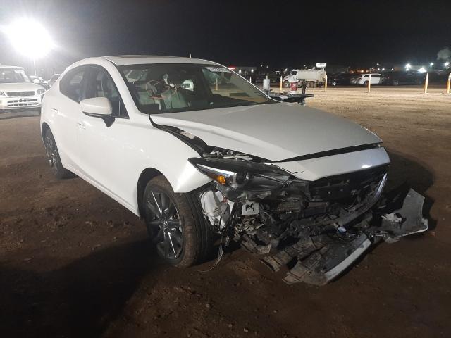 2018 mazda 3 grand to