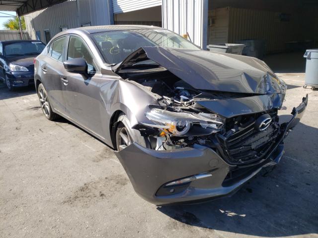 2018 mazda 3 grand to