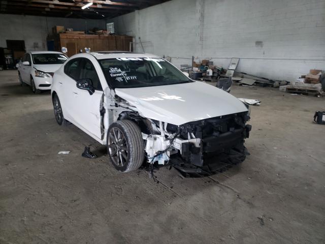 2018 mazda 3 grand to