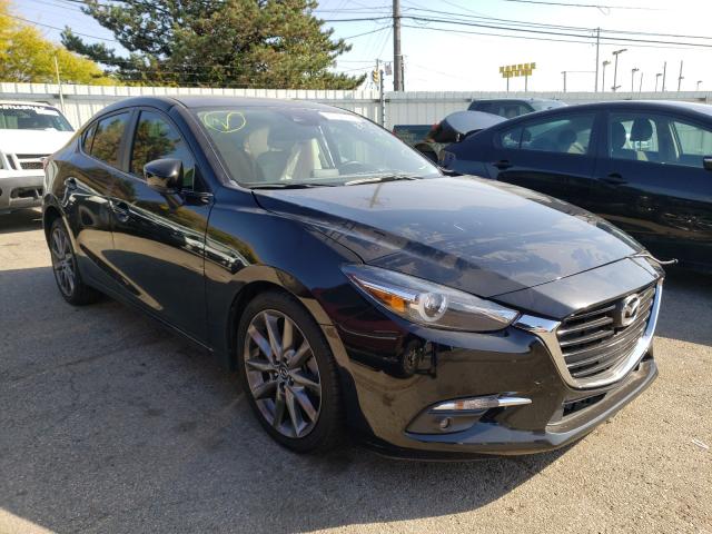 2018 mazda 3 grand to