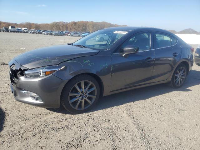 2018 mazda 3 grand to