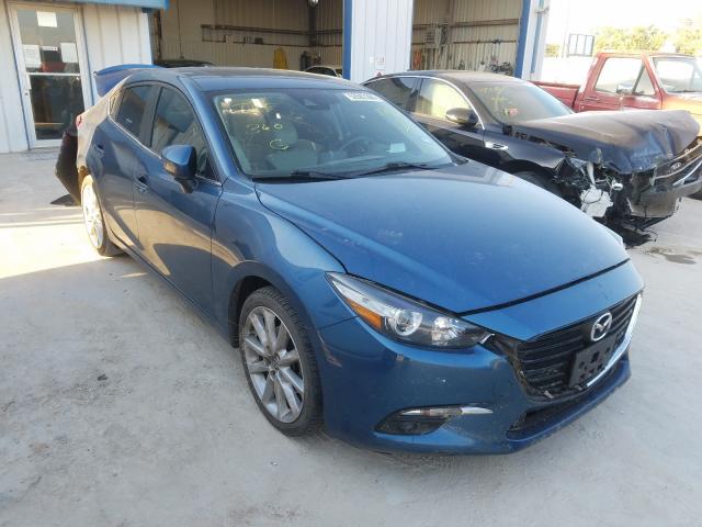 2017 mazda 3 grand to