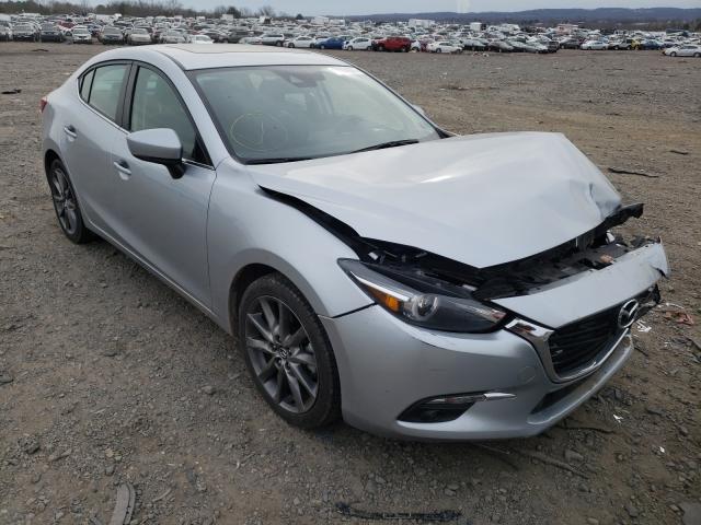 2018 mazda 3 grand to