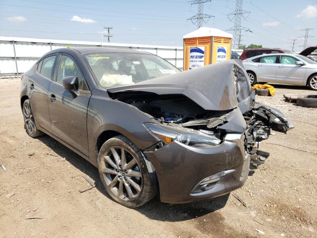 2018 mazda 3 grand to