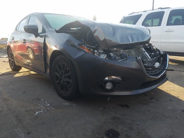 2014 mazda 3 grand to