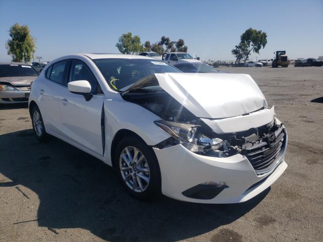 2014 mazda 3 grand to