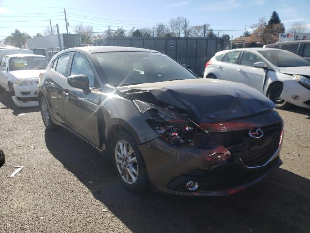 2014 mazda 3 grand to