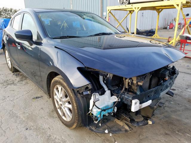2015 mazda 3 grand to
