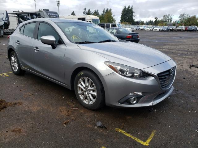 2014 mazda 3 grand to