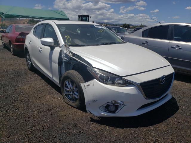 2014 mazda 3 grand to