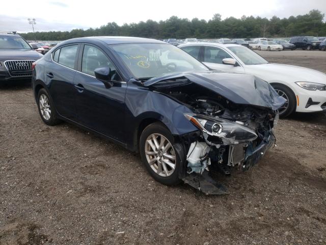 2015 mazda 3 grand to