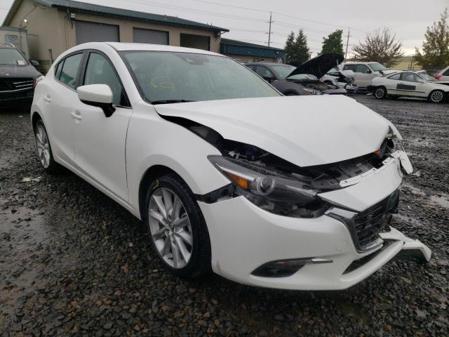 2017 mazda 3 grand to