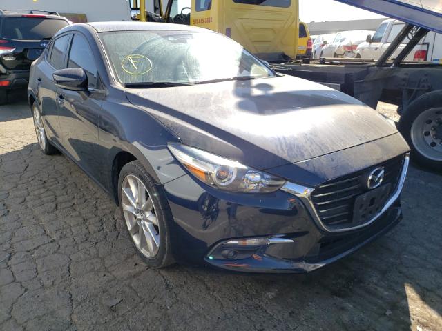 2017 mazda 3 grand to