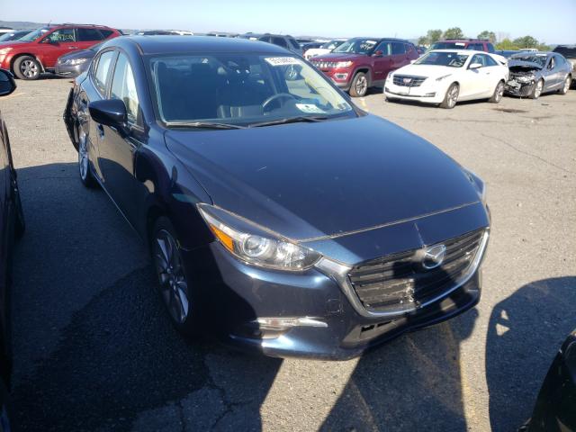 2017 mazda 3 grand to