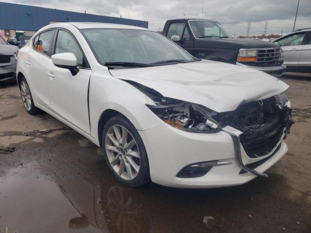 2017 mazda 3 grand to
