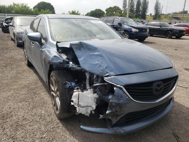 2014 mazda 6 grand to