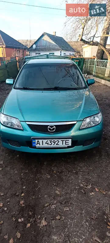 2002 mazda 323-1-6-i
