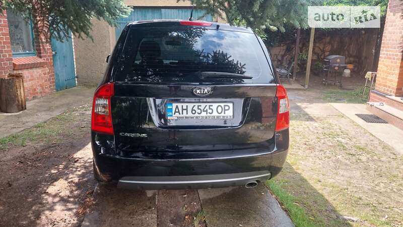 2011 kia carens