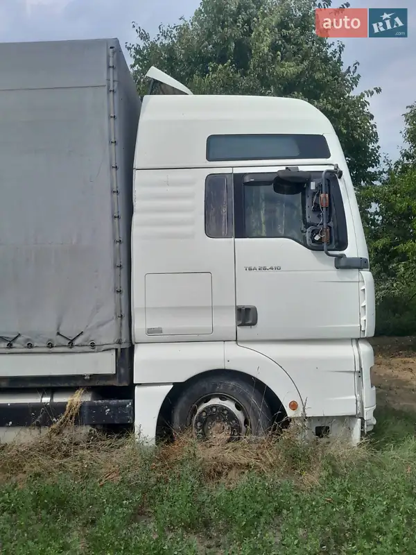 2003 man 26-410